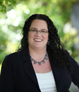 Hotel employee with dark brown hair